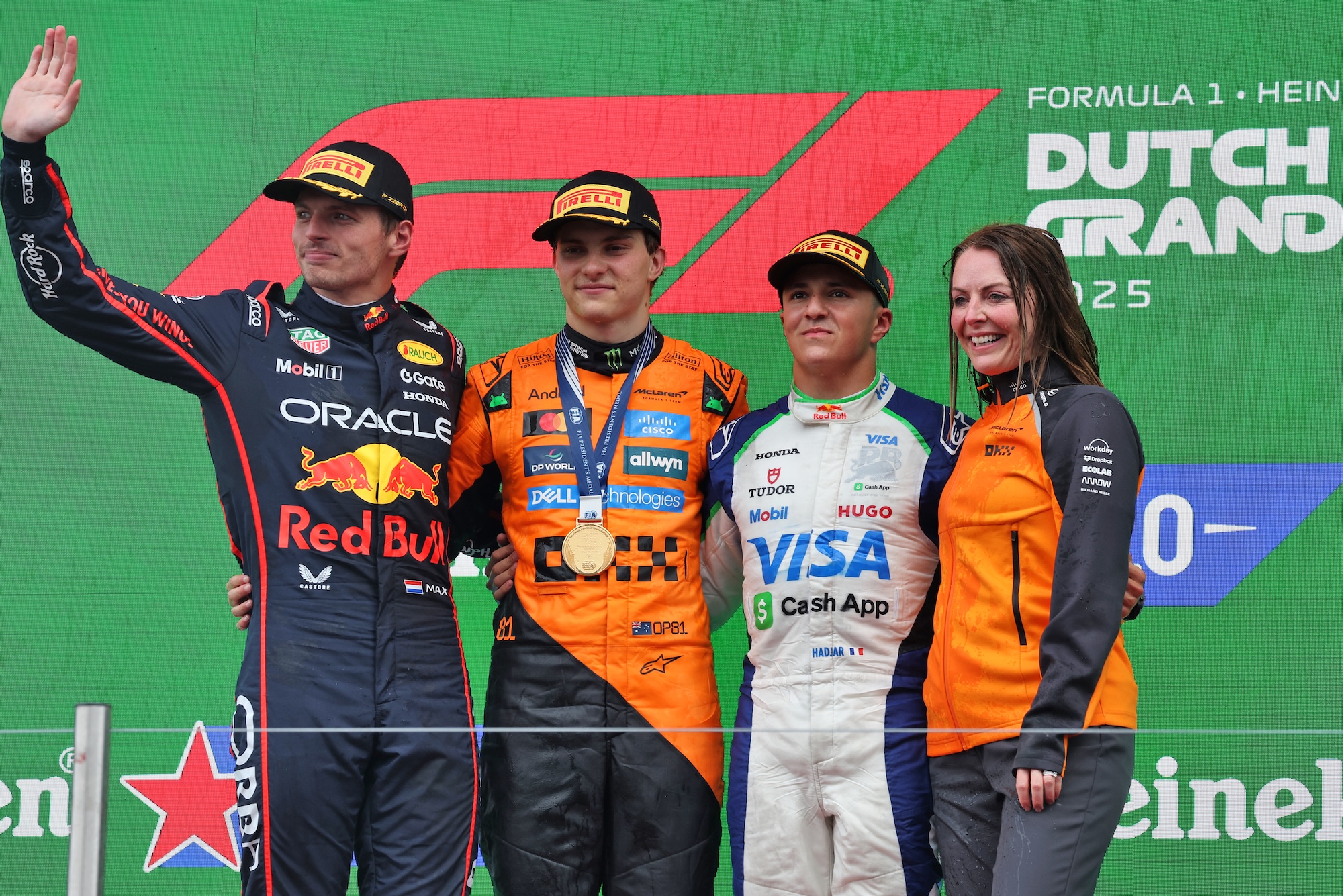 The podium (L to R): Max Verstappen (NLD) Red Bull Racing, second; Oscar Piastri (AUS) McLaren, race winner; Isack Hadjar (FRA) Racing Bulls, third; Laura Bowden (GBR) McLaren Chief Financial Officer.