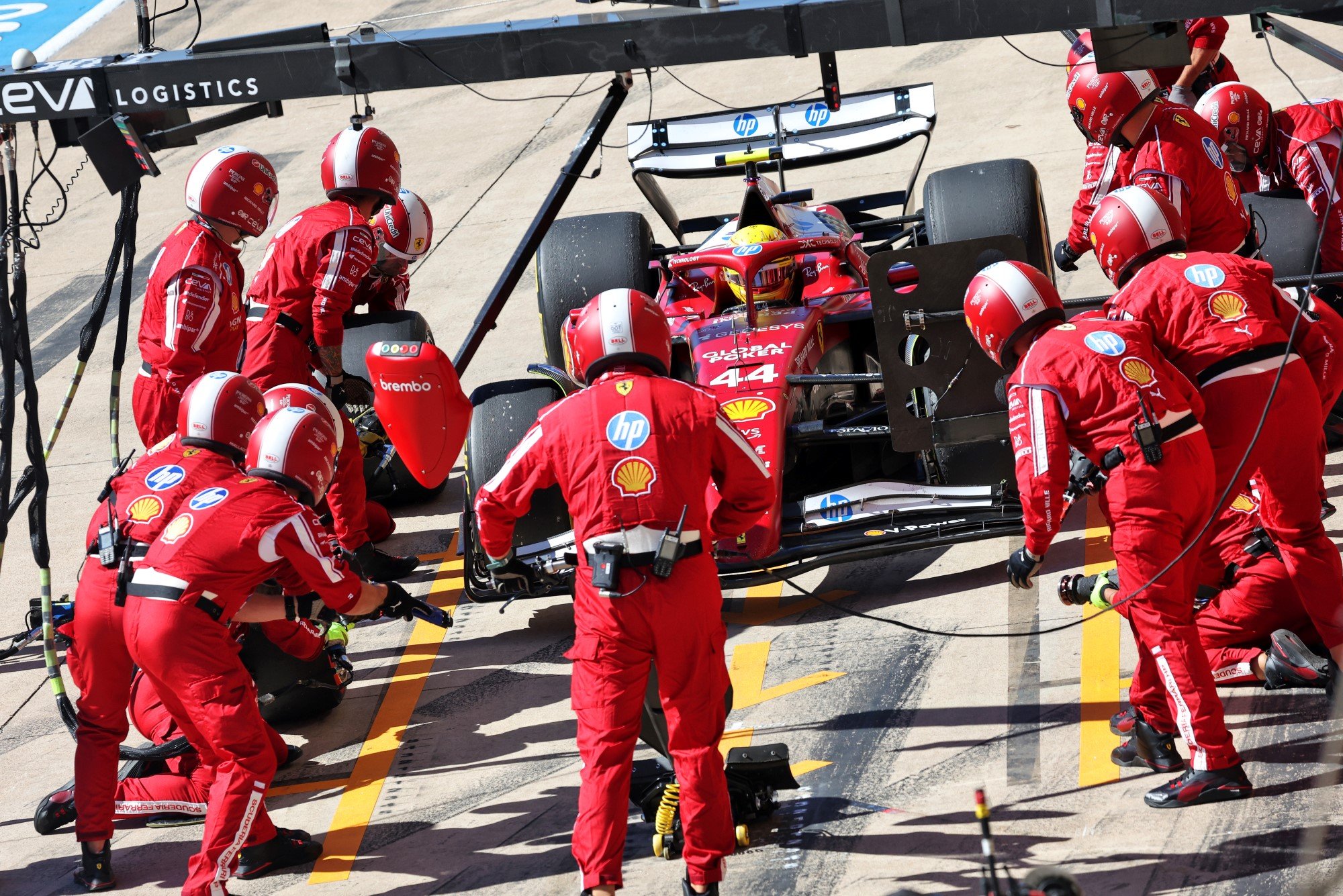 Lewis Hamilton (GBR) Ferrari SF-25 makes a pit stop.