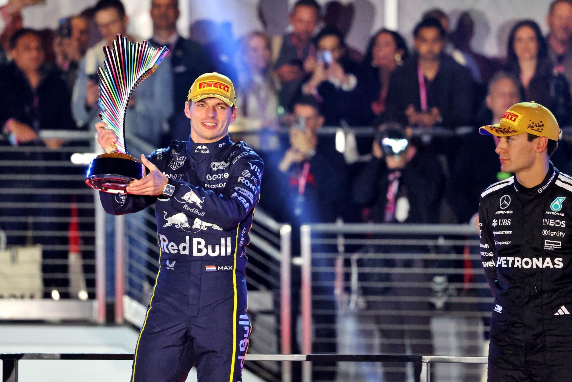 (L to R): Race winner Max Verstappen (NLD) Red Bull Racing on the podium with third placed George Russell (GBR) Mercedes AMG F1.
