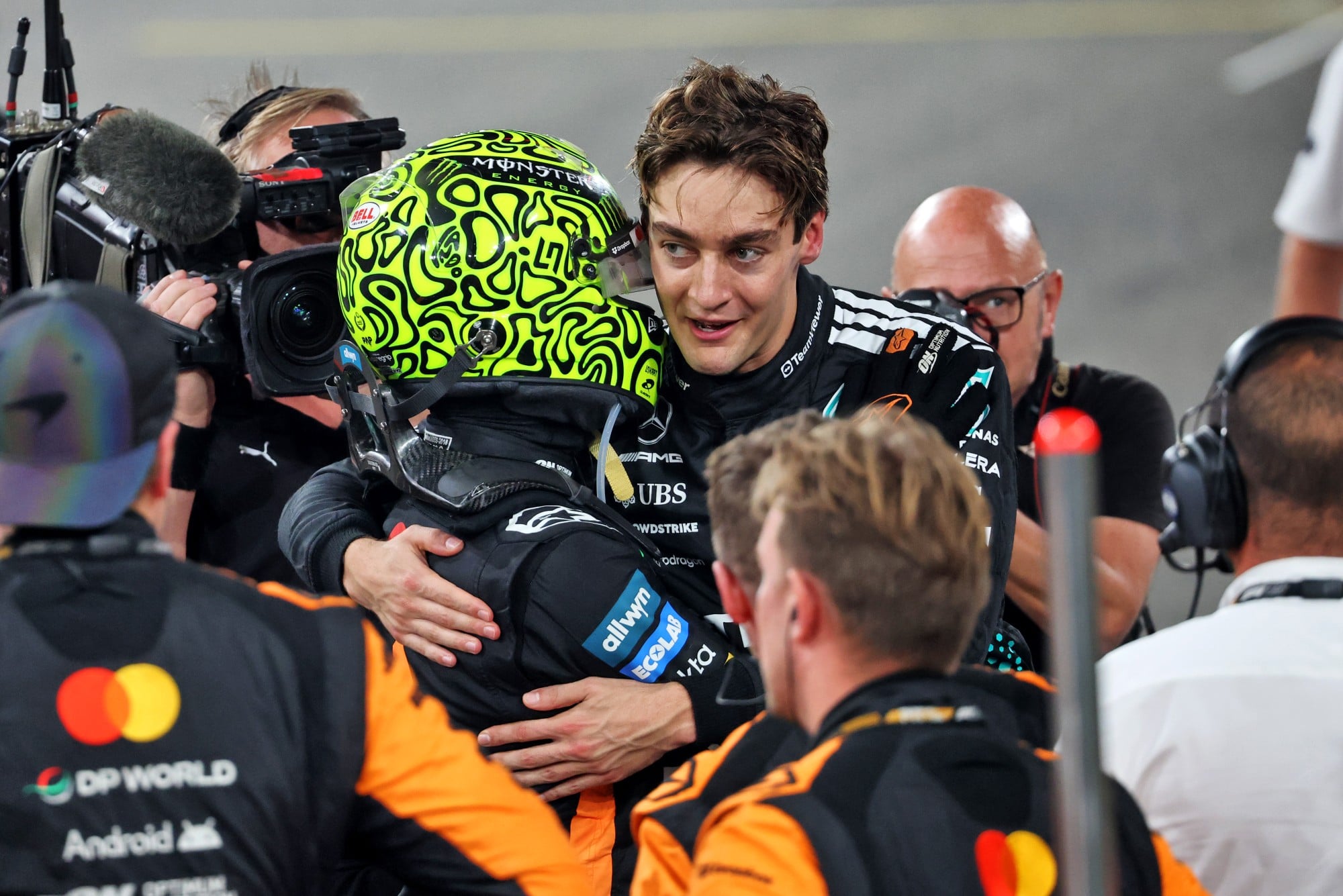 (L to R): Third placed World Champion Lando Norris (GBR) McLaren celebrates with George Russell (GBR) Mercedes AMG F1 in parc ferme.